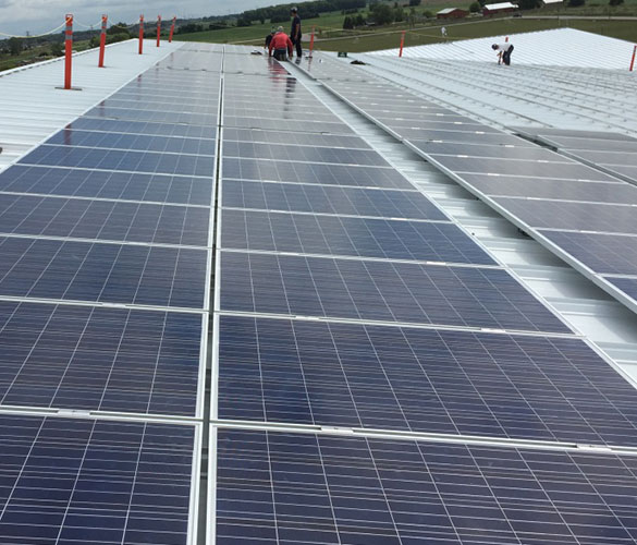 Essex Energy team installing solar panels