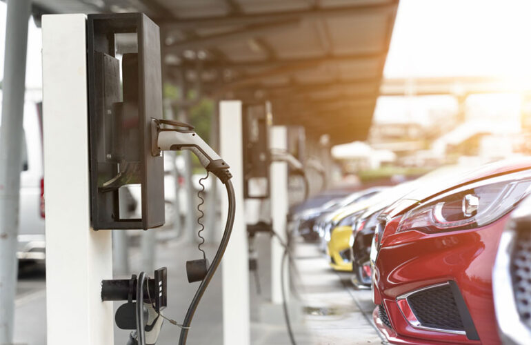 EV charging red car